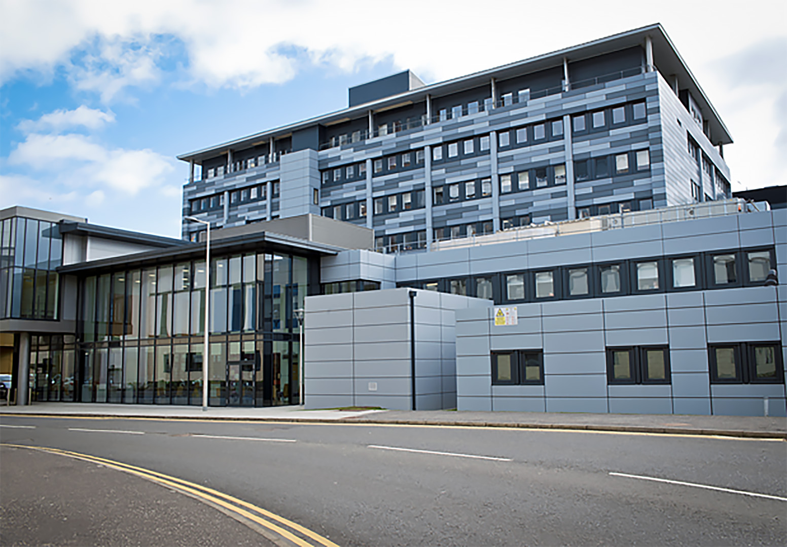 Front view of the INS surgical building based within the QEUH campus.